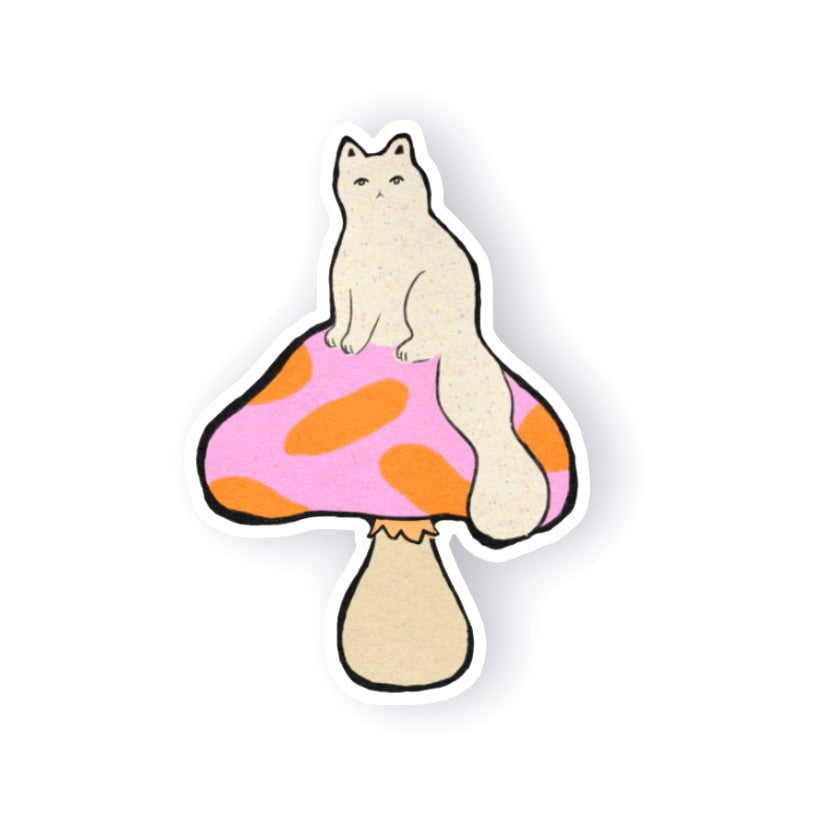 A die-cut sticker featuring a cream-colored cat sitting on a pink and orange spotted mushroom cap, shown on a plain white background with a soft drop shadow.